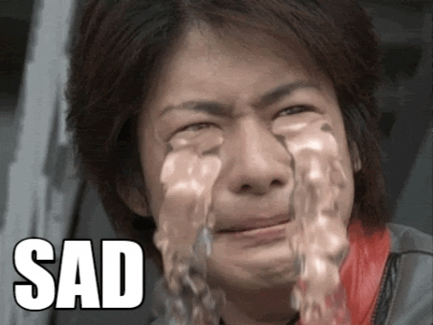 sad asian GIF