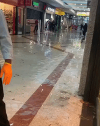 Shopping Centre Flooded After Heavy Rain Hits London