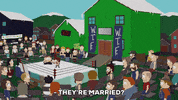 South Park gif. Crowd surrounds Eric and Jimmy who talk inside a wrestling ring in front of a lime green barn with flags that read, "WTF." Text, "They're married? You will have to forfeit the fight, Rad Russian! You cannot fight until your test results come back.