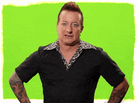 Celebrity gif. Tré Cool, the drummer from Green Day, sneers at us, hands on hips, saying, "Ew."