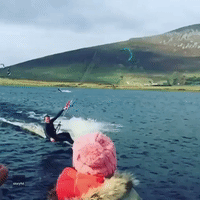 ‘You Want That Pizza to Go?’ Kitesurfer Grabs a Slice Midair