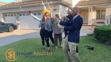 theangulogroup celebrate real estate yay pop GIF