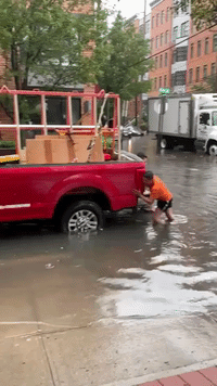 Vehicle Pushed Through Tropical Storm Fay Floodwater in Hoboken