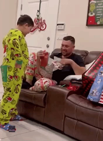 Video Shows Heartwarming Moment Stepfather Receives Adoption Papers for Son on Christmas Eve