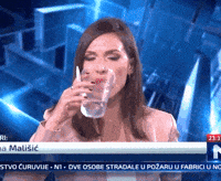 News Drinking GIF