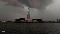 Lightning Strikes Near Statue of Liberty During Severe New York City Storms