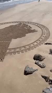 Queen Elizabeth II's Profile Etched Into Sand at Adelaide's Brighton Beach