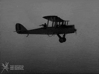 NationalWWIMuseum black and white airplane flight pilot GIF