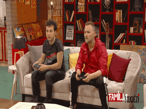 tringalbania giphyupload playing playstation videogame GIF