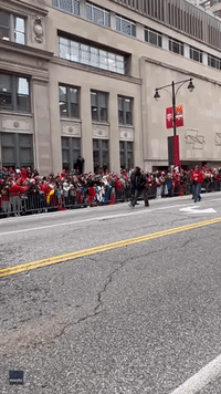Chiefs Player Signs Jersey for 9-Year-Old Fan at Super Bowl Parade