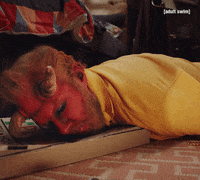 adultswim confused sleeping devil wake up GIF