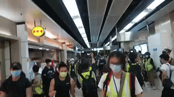 Riot Police Storm Hong Kong Mall to Break Up May Day Protest