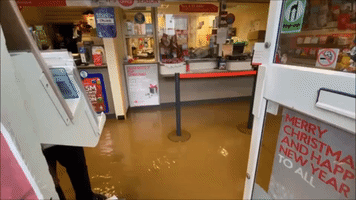Floodwater Inundates Shops and Streets in Hayle, England