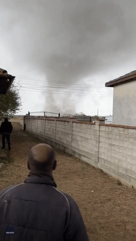 Tornado Kicks Up Dirt While Tearing Through Bulgarian Village