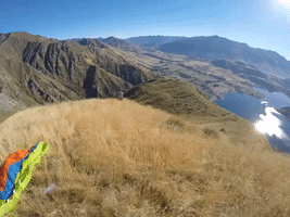 Daring Skydivers Do Full Rotations Through New Zealand Countryside