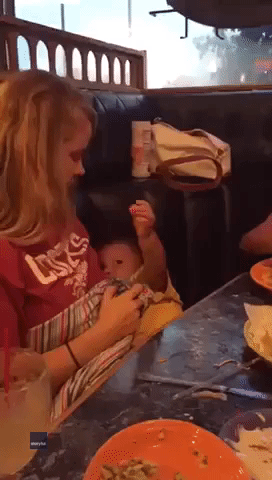 Sweet Baby Feeds Fries to Mom While Breastfeeding