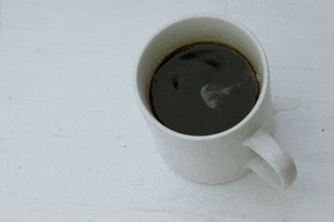 cup of coffee nom GIF