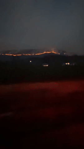 Homes Destroyed as Wildfire Rages on Mountain Slopes in Virginia