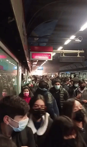Crowd Rushes From Train Station During Explosion