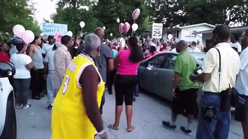 Ferguson Residents Hold Vigil for Girl, 9, Fatally Shot at Home