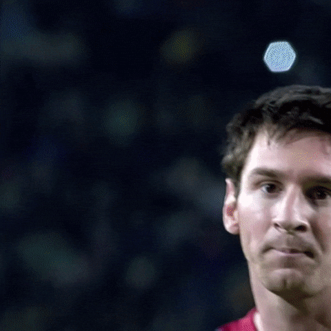 Sports gif. Lionel Messi FC Barcelona, counting on his fingers one two three, then pointing at us and winking.