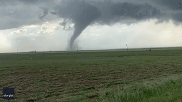 Tornado Sweeps Across Fields in Northern Texas