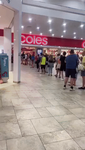 Huge Lines Outside Cairns Supermarket as Floodwaters Ease