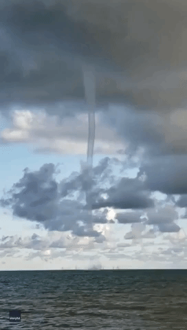 Waterspout Swirls Across Lake Huron