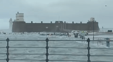 'Very Lucky Man' Rescued From Flooded English Promenade