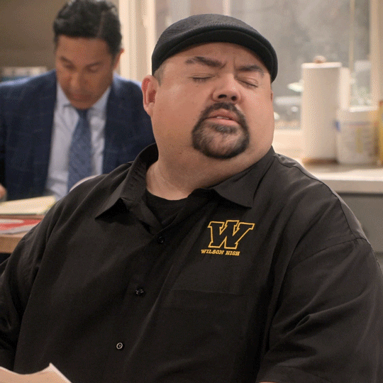 TV gif. Wearing a black polo shirt and a black Kangol hat, Gabriel Iglesias from Mr. Iglesias shakes his head quickly as if throwing a tantrum. Text, "I don't wanna."