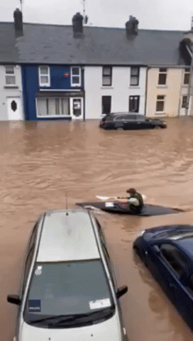 'Only Way of Commuting': Kayaker Takes to Flood-Hit Street in Wake of Storm Babet