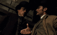robert downey jr handshake GIF