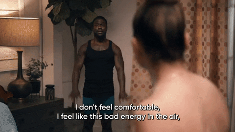 TV gif. Kevin Hart on Real Husbands of Hollywood looks at a woman and swings his arms at his sides nervously as he says, “I don’t feel comfortable, I feel like this bad energy in the air, and I don’t like it.”