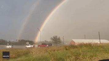 Double Rainbow Illuminates Sky Above Texas Highway