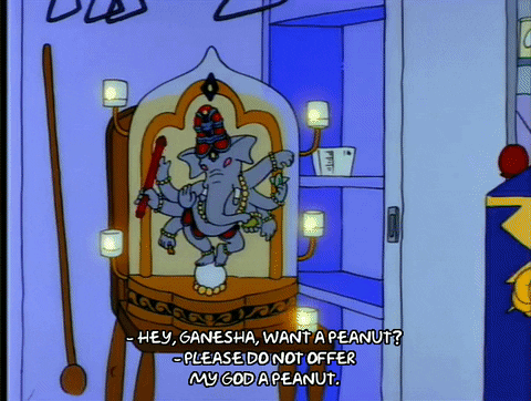 grabbing homer simpson GIF