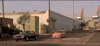 Movie gif. Vin Diesel as Dom and Paul Walker as Brian from Furious 7. They pull up to a stop and look at each other in their respective cars, as they're about to race. 
