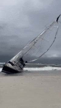 Sailboat Washes Ashore as Dangerous Currents Lash Gulf Coastline