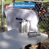 CarnivalSavers carnival savers carnivalsaverscom carnival game knock down bottles milk jug game GIF