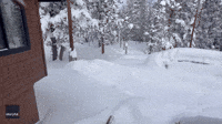 Teenager Jumps into Deep Snow as Winter Storm Buries Colorado
