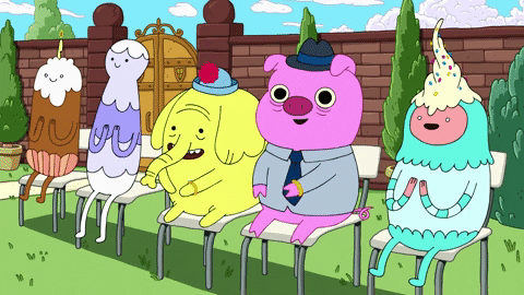 Cartoon gif. The cast of Adventure Time are sitting outside on individual folding chairs and are clapping with smiles on their faces.