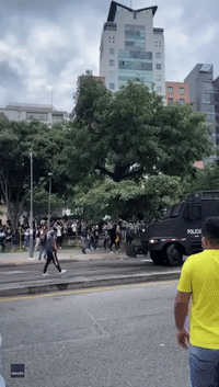 Police Deploy Water Cannon at Tax-Reform Protest in Colombia