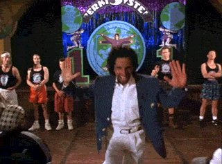 Movie gif. Ben Stiller as Tony Perkis in Heavyweights runs from a stage, down the aisle, with his hands up for high fives, but only one audience member gives him one.