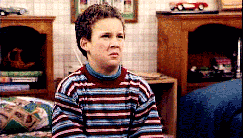 TV gif. Young Ben Savage as Cory Matthews in Boy Meets World scrunches up his face in disgust.