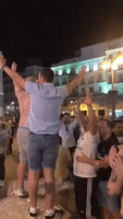 Real Madrid Fans Celebrate Champions League Final Victory in Madrid's Puerta del Sol