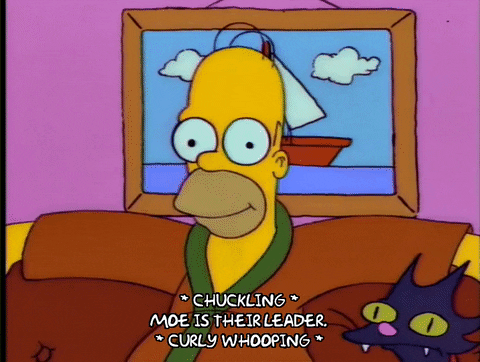 chuckling homer simpson GIF