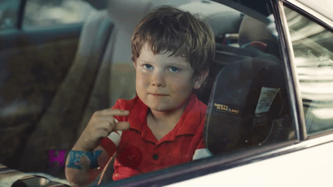 little kid staring staredown GIF