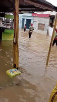 Dominicans Wade Through Knee-High Floodwater After Hurricane Fiona Hits Higuey