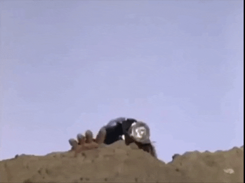 Hiding Creeping GIF by The Monkees
