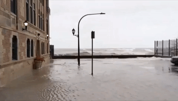 Lake Michigan Waves Crash Onto Street as Flooding Affects Chicago