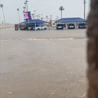 Floodwater Gushes Through Arizona Streets